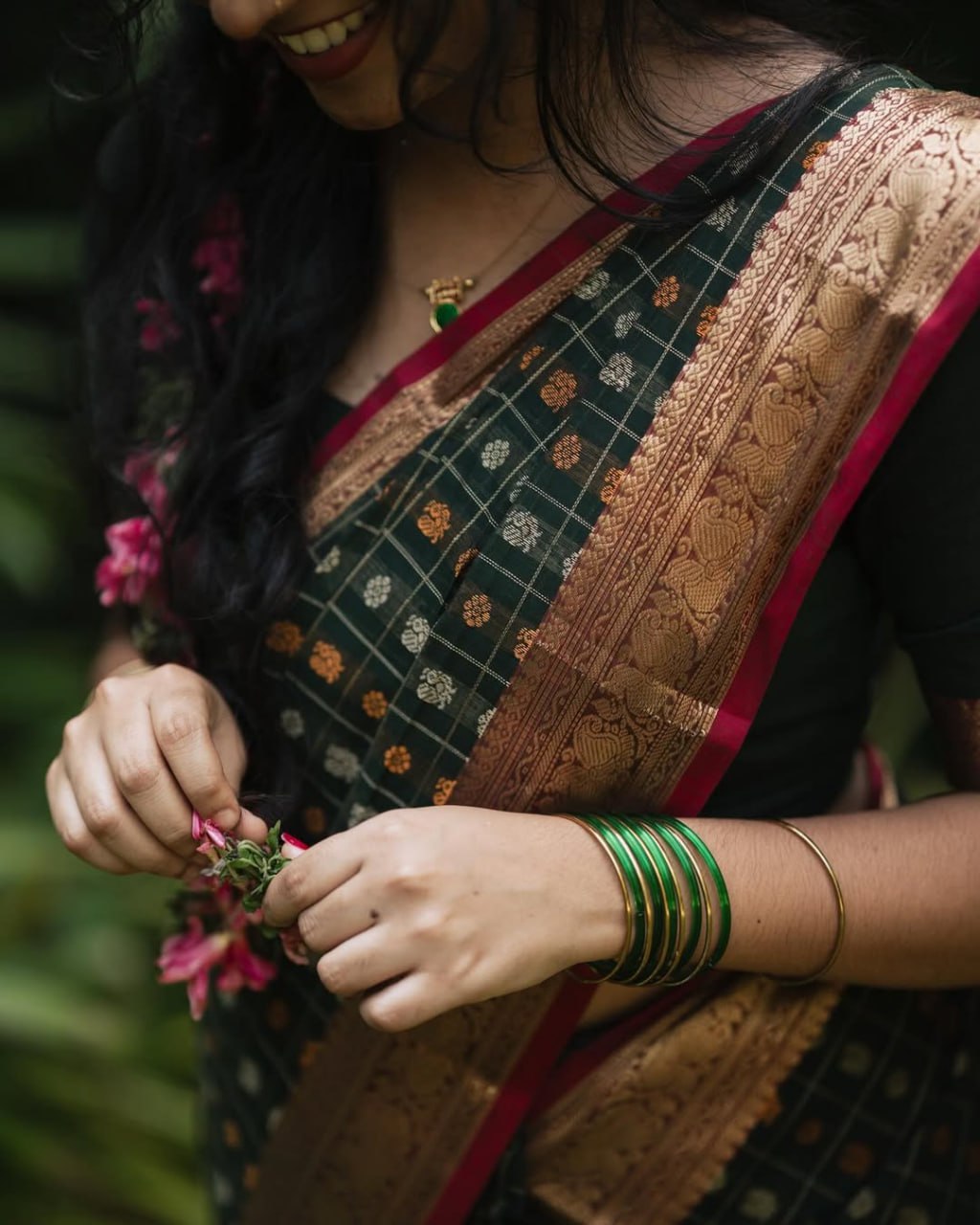 Grean fulljadi adorned with beautiful Zari work in form of traditional motifs.