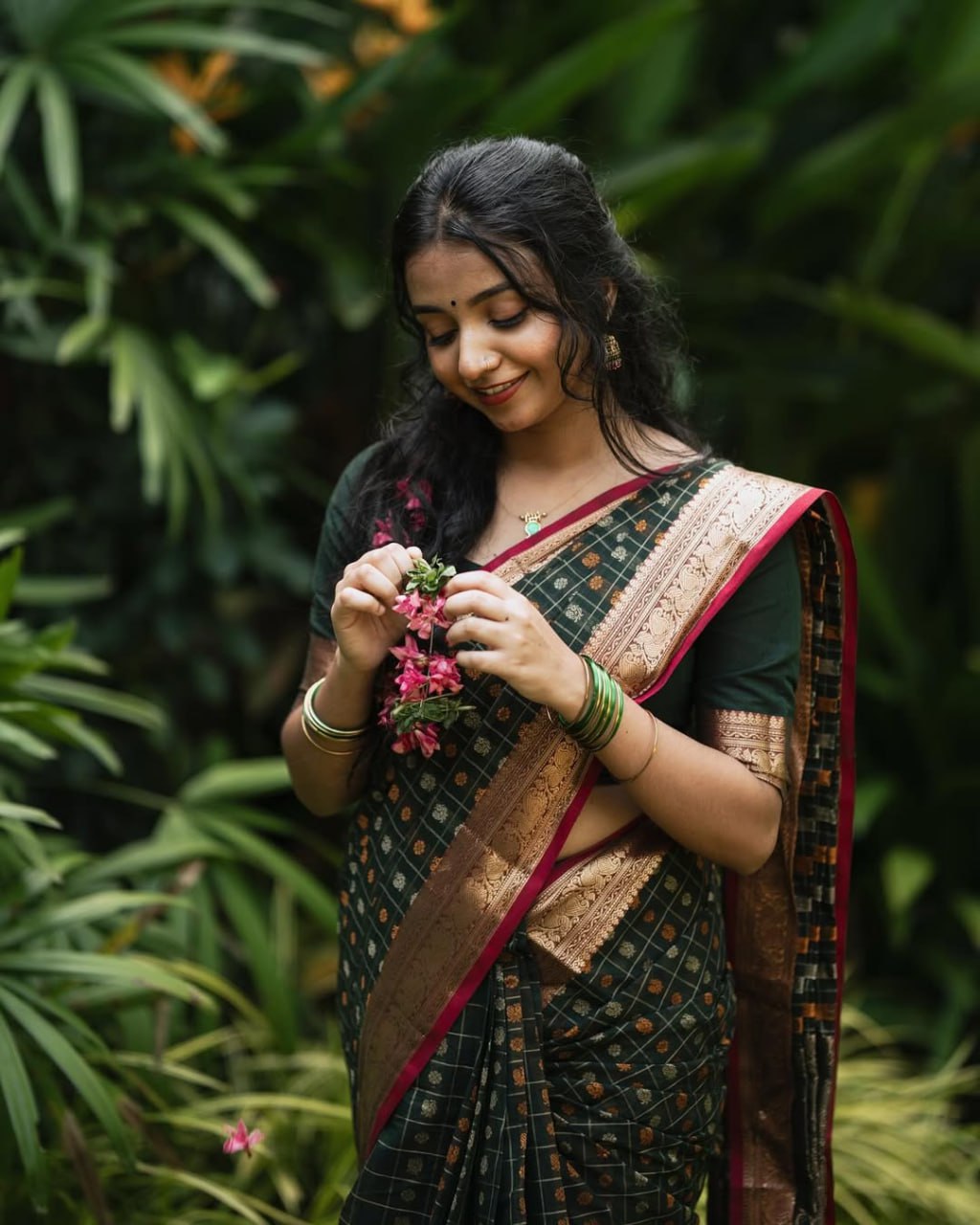 Grean fulljadi adorned with beautiful Zari work in form of traditional motifs.