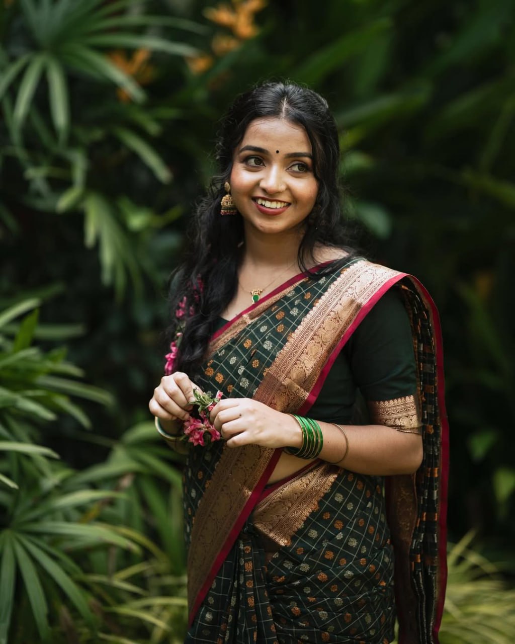 Grean fulljadi adorned with beautiful Zari work in form of traditional motifs.