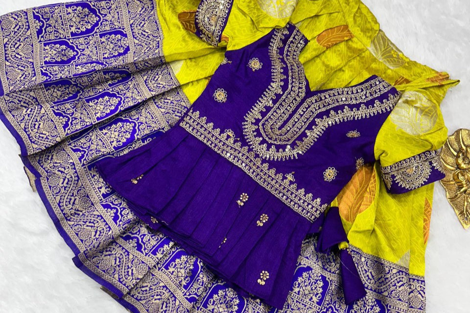 Purple and yellow traditional outfit with floral decoration on a white background